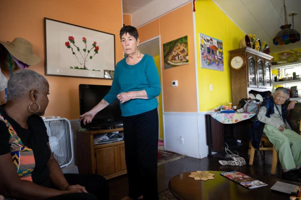 Capital Mobile Estates residents Maria Ruiz, center, Bobbyie Waters, left, and Katie Brawley describe harassment on Thursday, June 22, 2023, by their mobile home park’s manager at Capital Mobile Estates in Sacramento.