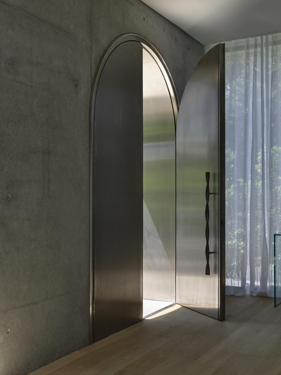 steel front door opening into hallway