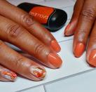 <p>We'll be the first to admit water marbling your nails is trickier than it looks. So, keep the painterly effect to just one or two nails as accents, then go with a punchy orange for the rest—you'll thank us later. </p><p><a href="https://www.instagram.com/p/CCW5WFfFSSk/" rel="nofollow noopener" target="_blank" data-ylk="slk:See the original post on Instagram;elm:context_link;itc:0;sec:content-canvas" class="link ">See the original post on Instagram</a></p>