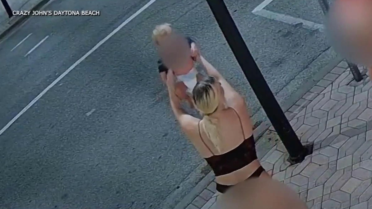 Florida women outside Coyote Ugly bar seen tossing baby around like a toy moments before fight breaks