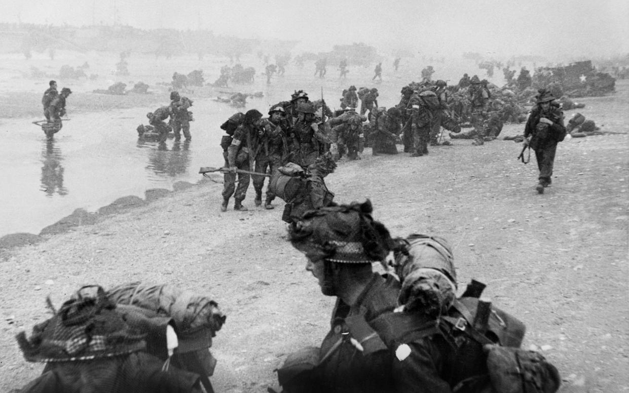 British troops take positions on Sword beach during D-Day - AFP