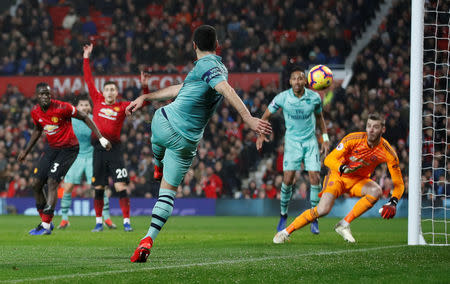 Soccer Football - Premier League - Manchester United v Arsenal - Old Trafford, Manchester, Britain - December 5, 2018 Arsenal's Henrikh Mkhitaryan scores a disallowed goal due to offside Action Images via Reuters/Carl Recine