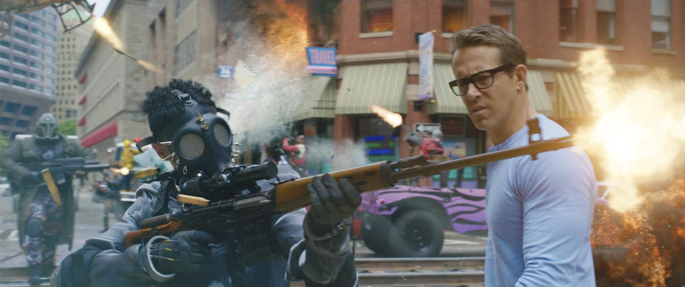 This image released by Disney shows Ryan Reynolds as Guy in a scene from "Free Guy." (Disney-Twentieth Century Fox via AP)