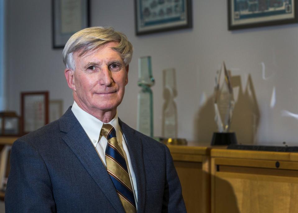 Mike Bowman, State Director of the Delaware Small Business Development Center, poses for a portrait in his office in Newark on Tuesday afternoon.