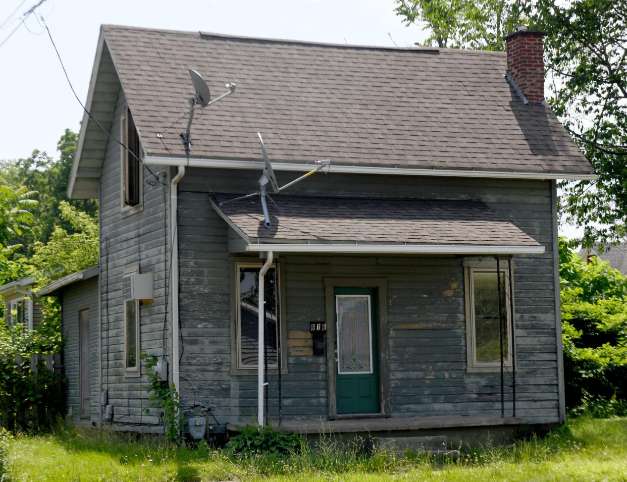 A home in the 600 block of Correll Avenue NE in Canton has been a focal point of a killing and torture case.