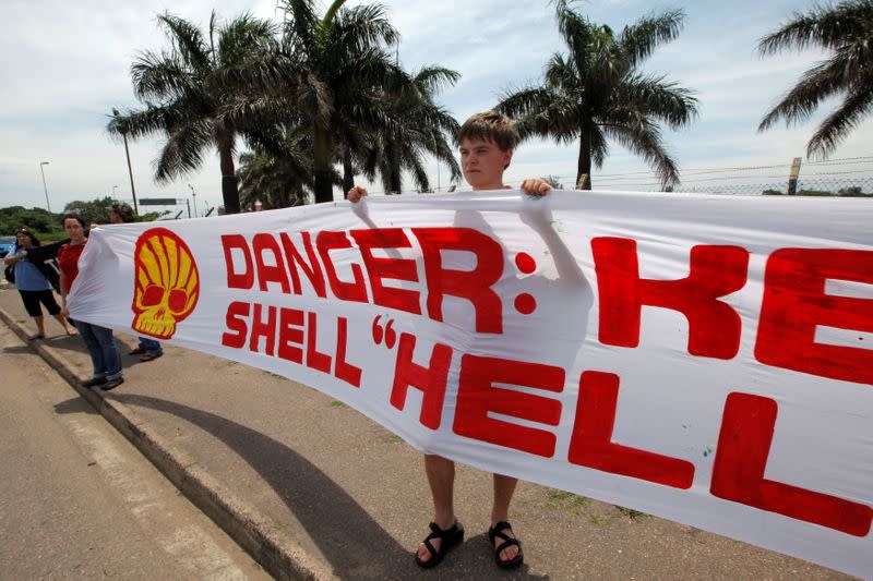 FILE PHOTO: Members of the Indigenous Environmental Network demonstrate against the Shell oil company outside the South African Petroleum Refinery (SAPREF) in Durban