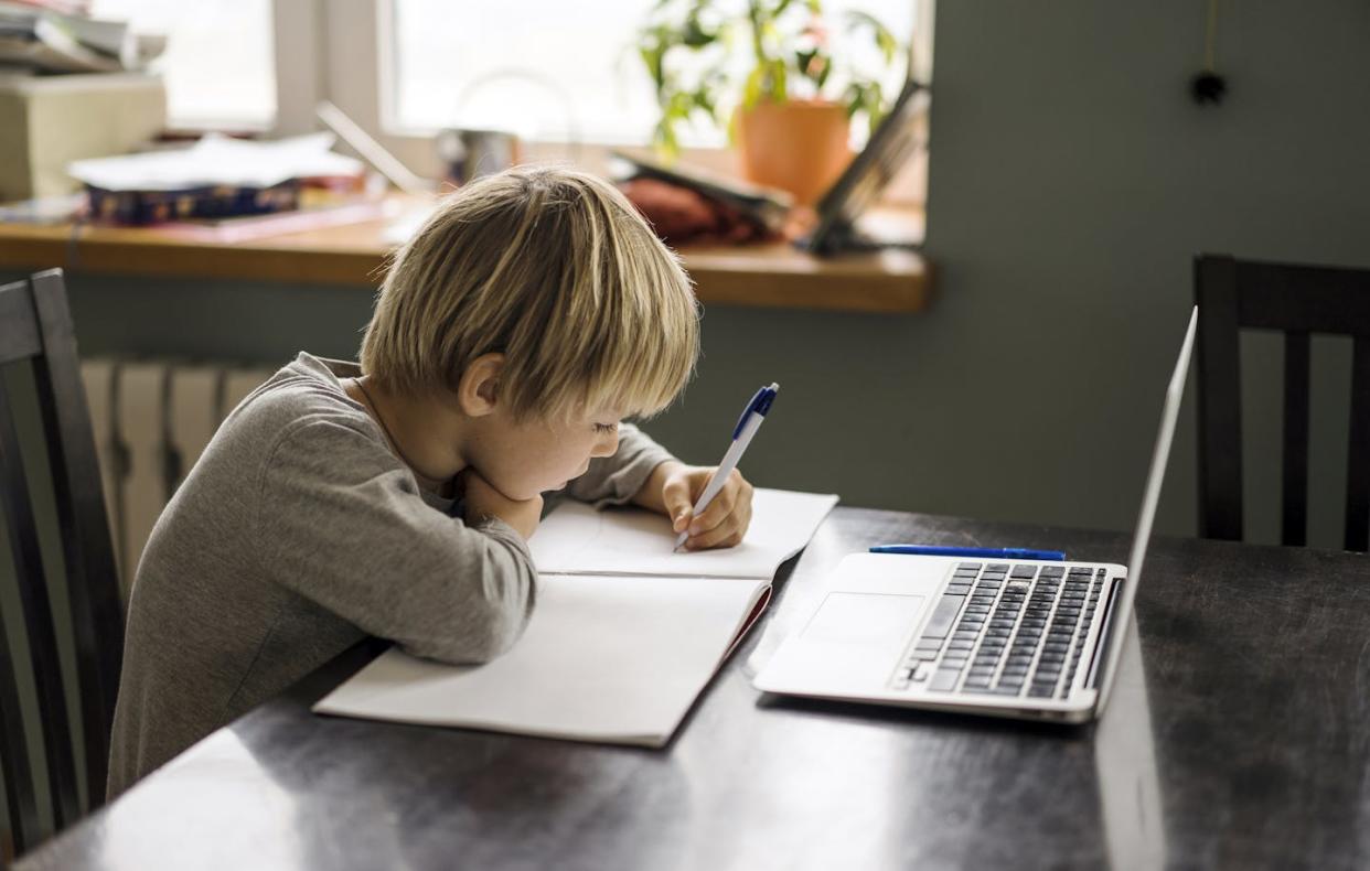 The best place to study is in a space with no distractions and plenty of light. <a href="https://www.gettyimages.com/detail/photo/young-boy-making-notes-while-using-laptop-royalty-free-image/652717373?phrase=child+studying+at+home+in+room&adppopup=true" rel="nofollow noopener" target="_blank" data-ylk="slk:Hans Neleman/Stone via Getty Images;elm:context_link;itc:0;sec:content-canvas" class="link ">Hans Neleman/Stone via Getty Images</a>