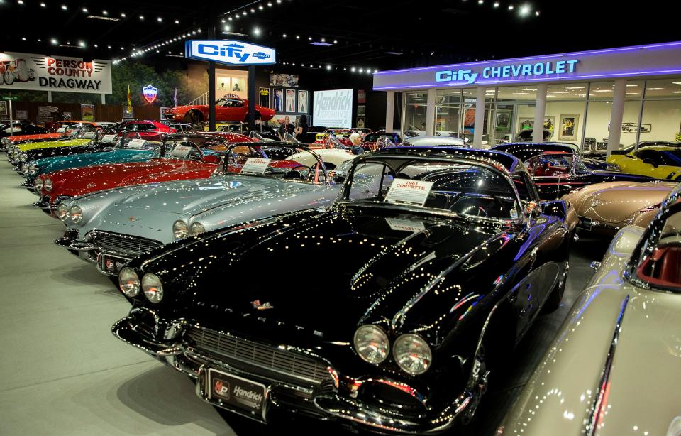 A row of Corvettes sits in front of a replica of the City Chevrolet store in Charlotte, North Carolina, which would become the precursor to the Hendrick Automotive Group inside Rick Hendrick's 58,000-square-foot Heritage Center in Concord, North Carolina,  on July 25, 2023. Hendrick is one of the top Corvette collectors in the world. He owns 220 collector cars in the Heritage Center, 122 of which are rare Corvettes.
