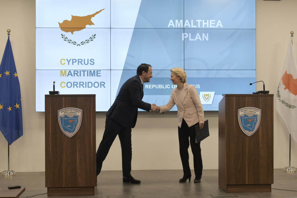 President of the European Commission, Ursula von Der Leyen, right, and Cypriot President Nikos Christodoulides shake hands after a press conference at the Joint Search and Rescue Coordination center in Larnaca, Cyprus, on Friday March 8, 2024. Von der Leyen is in Cyprus to inspect facilities at the port of Larnaca from where it's hoped ships will soon start departing for Gaza to deliver aid amid growing international support for the Cypriot initiative to establish a maritime humanitarian corridor to the Palestinian enclave some 240 miles (386 kilometers) away. (AP Photo/Marcos Andronicou)