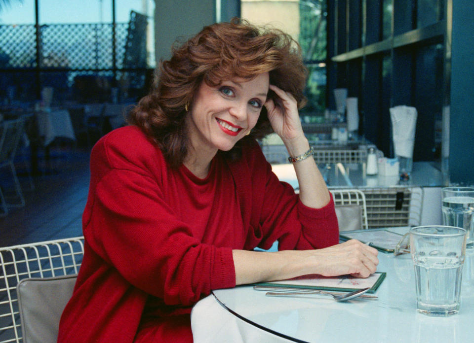 Actress Valerie Harper poses for a photo in Los Angeles on Feb. 5, 1990. Harper, who stole hearts and busted TV taboos as the brash, self-deprecating Rhoda Morgenstern on back-to-back hit sitcoms in the 1970s, died of cancer on Aug. 30. She was 80. (AP Photo/Julie Markes)