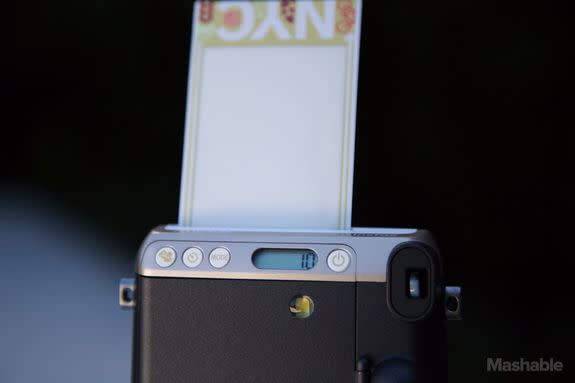 The viewfinder is larger and sharper than older Fujifilm Instax film cameras.