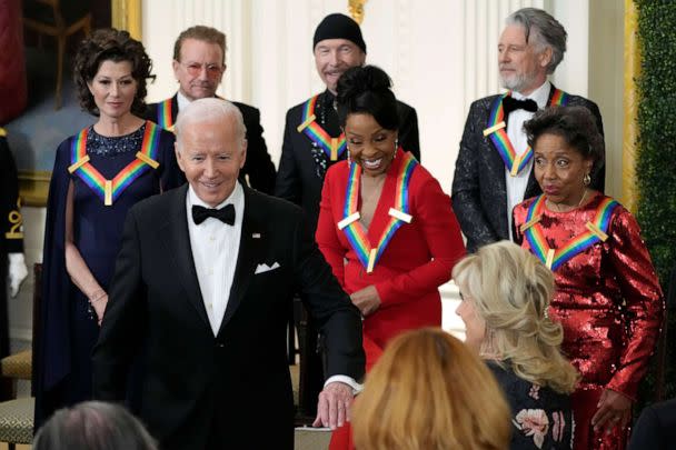 PHOTO: President Joe Biden holds out his arm for first lady Jill Biden as they leave the Kennedy Center honorees reception at the White House, Dec. 4, 2022, in Washington. (AP Photo/Manuel Balce Ceneta)