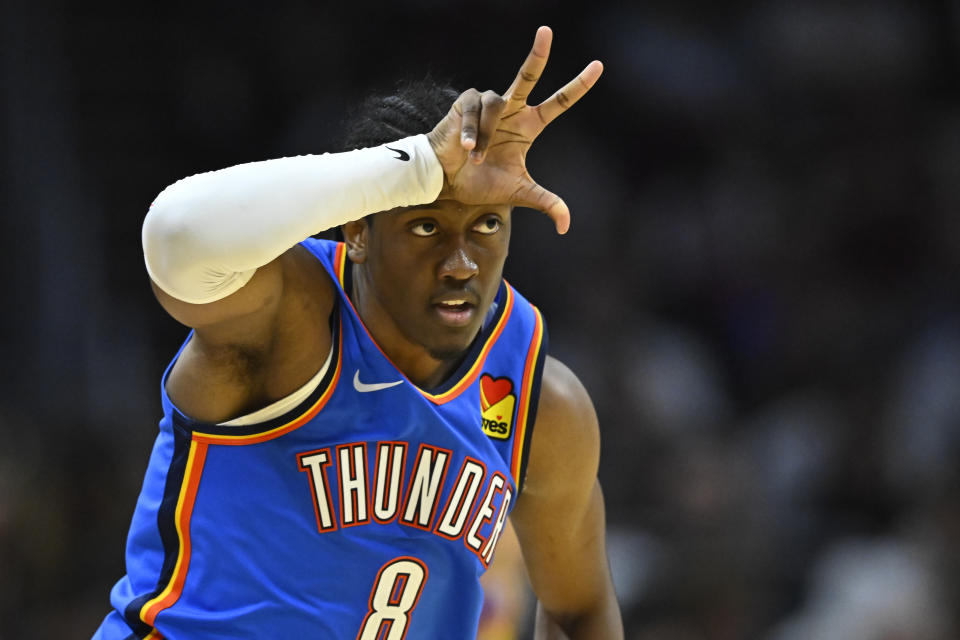 Oct 27, 2023; Cleveland, Ohio, USA; Oklahoma City Thunder forward Jalen Williams (8) celebrates a three point basket in the third quarter against the Cleveland Cavaliers at Rocket Mortgage FieldHouse. Mandatory Credit: David Richard-USA TODAY Sports