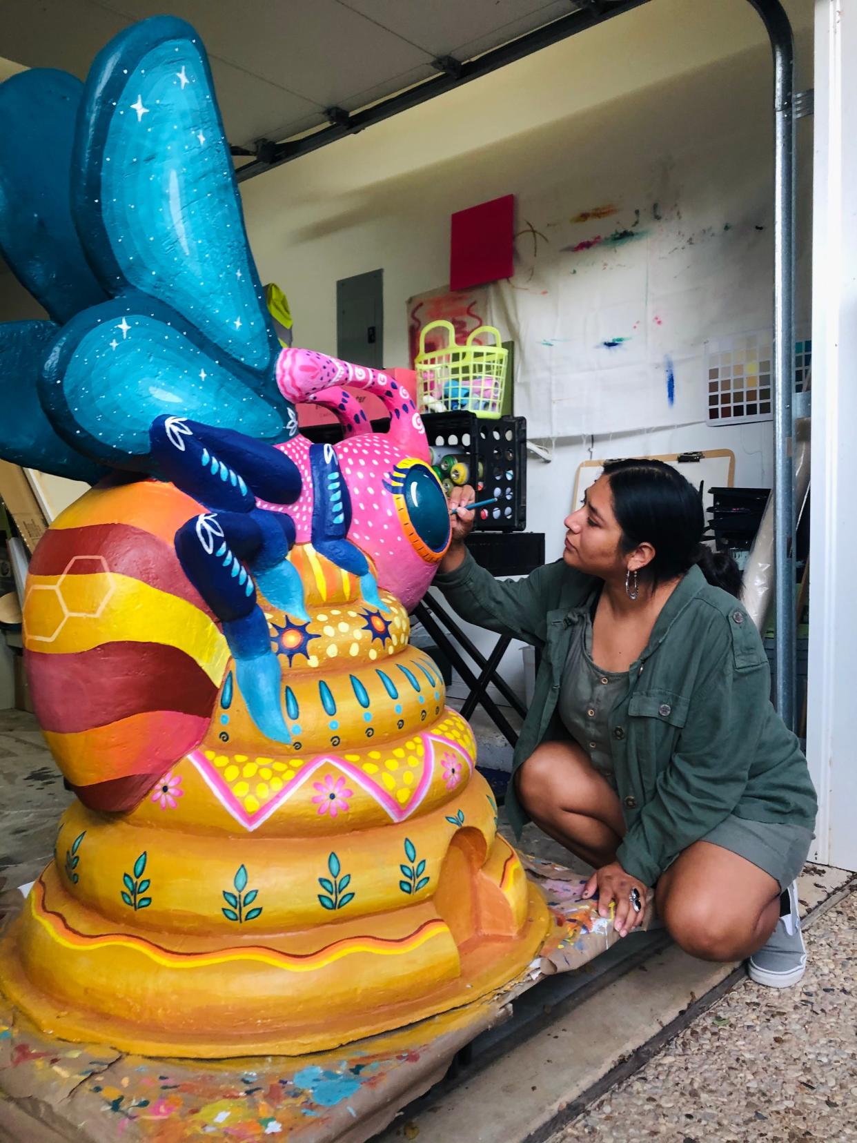 Carmen Rangel, a visual artist in Austin, said she wanted to incorporate elements of Mexican folk art and the bright colors that define her work into her bee statue. The statue is called 'Four Elements.'