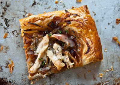 <div class="caption-credit"> Photo by: Photo by Sarah Flotard</div><b>Caramelized Onion Tart with Chicken and Gruyÿre <br></b> <br> Place a sheet of all-butter puff pastry on a baking sheet lined with parchment paper. Brush 1" border on all sides with beaten egg. Scatter a layer of caramelized onions over pastry, staying inside border. Top onions with shredded chicken, grated Gruyÿre, and fresh thyme leaves. Bake at 425 degrees until crust is shiny and golden brown and cheese is melted.