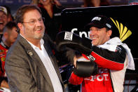 FORT WORTH, TX - NOVEMBER 06: Texas Motor Speedway president Eddie Gossage (L) poses with Tony Stewart, driver of the #14 Office Depot/Mobil 1 Chevrolet, in Victory Lane after winning the NASCAR Sprint Cup Series AAA Texas 500 at Texas Motor Speedway on November 6, 2011 in Fort Worth, Texas. (Photo by Chris Graythen/Getty Images)