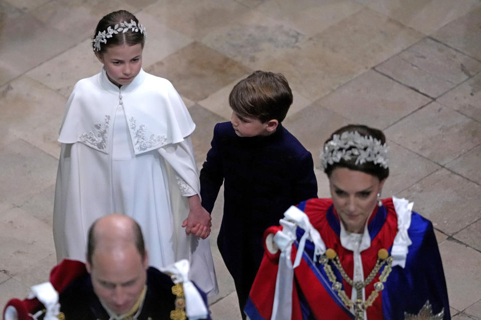 <p>LONDON, ENGLAND - MAY 06: Princess Charlotte and Prince Louis hold hands following the Coronation of King Charles III and Queen Camilla at Westminster Abbey on May 6, 2023 in London, England. The Coronation of Charles III and his wife, Camilla, as King and Queen of the United Kingdom of Great Britain and Northern Ireland, and the other Commonwealth realms takes place at Westminster Abbey today. Charles acceded to the throne on 8 September 2022, upon the death of his mother, Elizabeth II. (Photo by Kirsty Wigglesworth - WPA Pool/Getty Images)</p> 