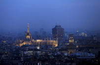 FILE PHOTO - Duomo's Cathedral is illuminated during night time in downtown Milan, northern Italy March 2, 2015. REUTERS/Stefano Rellandini/File Photo