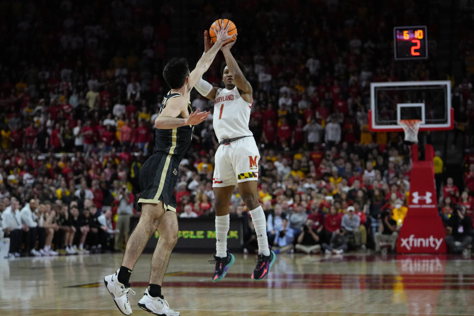 Maryland guard Jahmir Young (1) shoots against Purdue guard Ethan Morton during the second half of an NCAA college basketball game, Thursday, Feb. 16, 2023, in College Park, Md. Maryland won 68-54. (AP Photo/Julio Cortez)