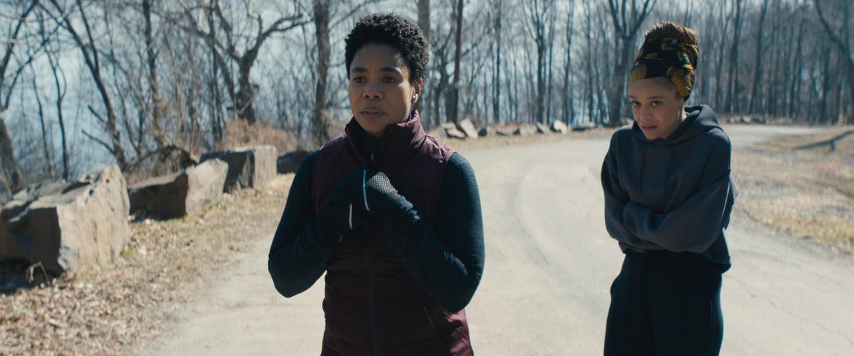 Regina Hall (left, with Amber Gray) plays a faculty member at a predominantly white New England college where some strange things are afoot in the social horror film 