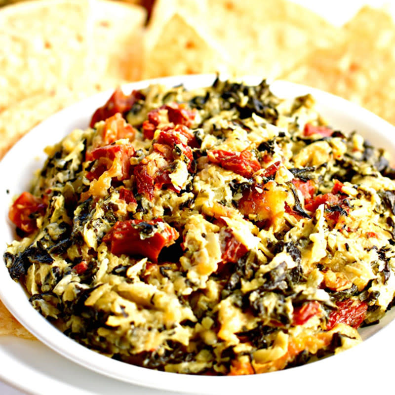 <p>Mama Knows Gluten Free</p><p>This tasty dip with spinach, artichokes, and sun-dried tomatoes may become your go-to appetizer for parties.</p><p><strong>Get the recipe: <a href="https://www.mamaknowsglutenfree.com/hot-artichoke-spinach-and-sun-dried-tomato-dip-gluten-free/" rel="nofollow noopener" target="_blank" data-ylk="slk:Hot Spinach, Artichoke and Sun-Dried Tomato Dip;elm:context_link;itc:0;sec:content-canvas" class="link rapid-noclick-resp">Hot Spinach, Artichoke and Sun-Dried Tomato Dip </a></strong></p>