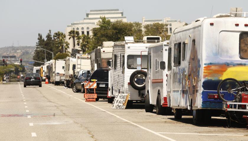 LOS ANGELES, CA - JUNE 11: Campers are parked along West Jefferson Blvd as Scott Culbertson, executive director of Friends of the Ballona Wetlands gives a tour of some of the destruction caused by homeless encampments that are encroaching on the Freshwater Marsh in Ballona Wetlands. Play Del Rey on Friday, June 11, 2021 in Los Angeles, CA. (Al Seib / Los Angeles Times).