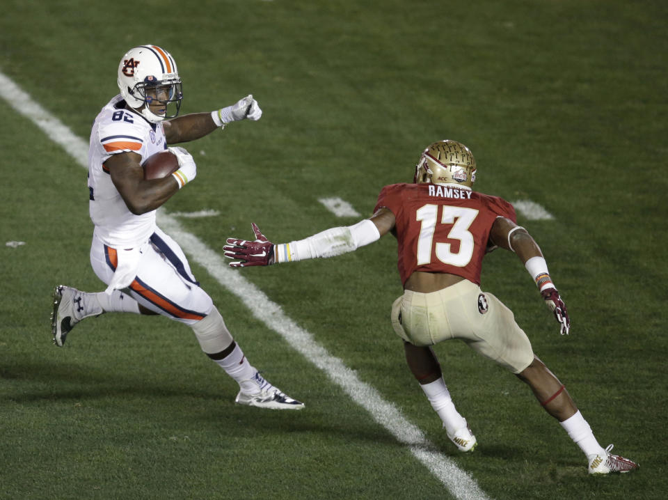 Auburn's Melvin Ray gets past Florida State's Jalen Ramsey for a touchdown catch during the first half of the NCAA BCS National Championship college football game Monday, Jan. 6, 2014, in Pasadena, Calif. (AP Photo/Gregory Bull)