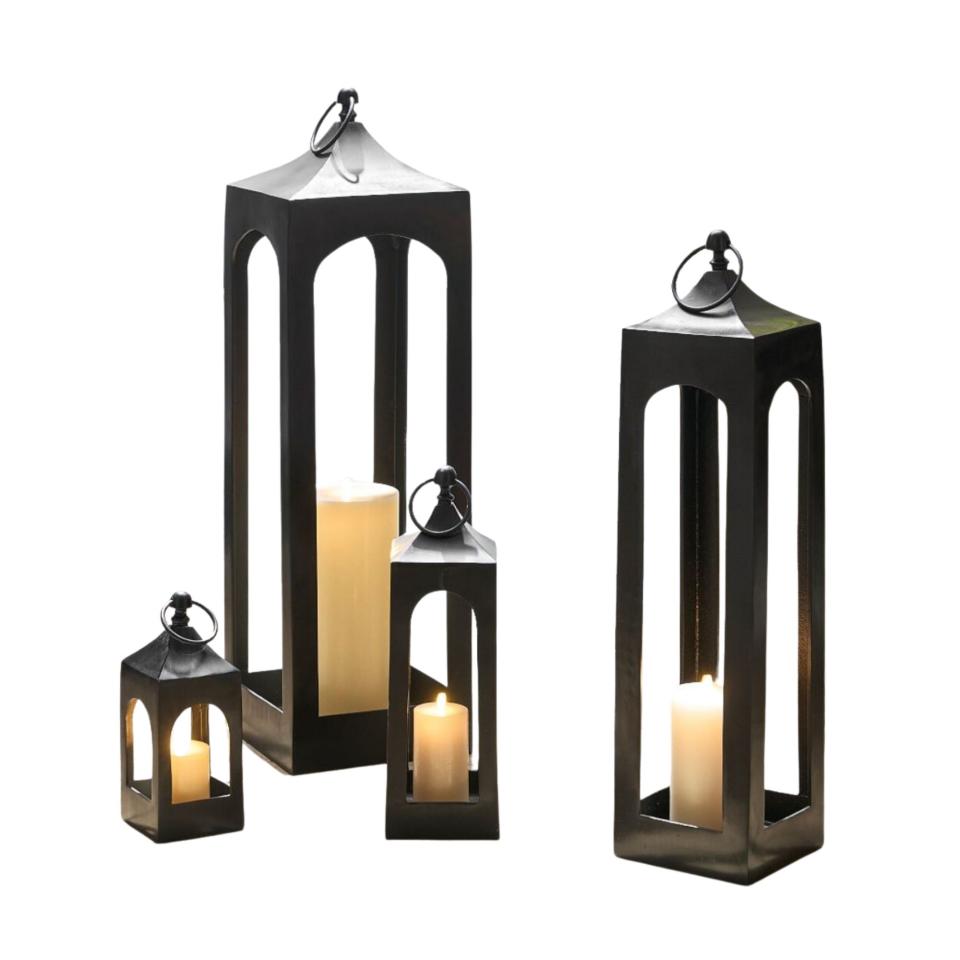 Four black metal lanterns