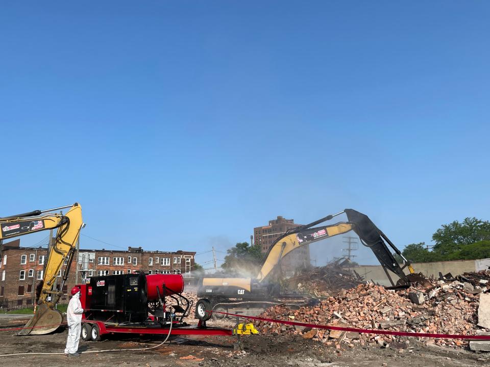 Excavators work July 31, 2023 at the site of razed a building at 3143 Cass Ave. The 140-year-old building used to be a major center for the Asian American community in the city's historic Chinatown. It was demolished July 29 over the objections of Asian American activists.