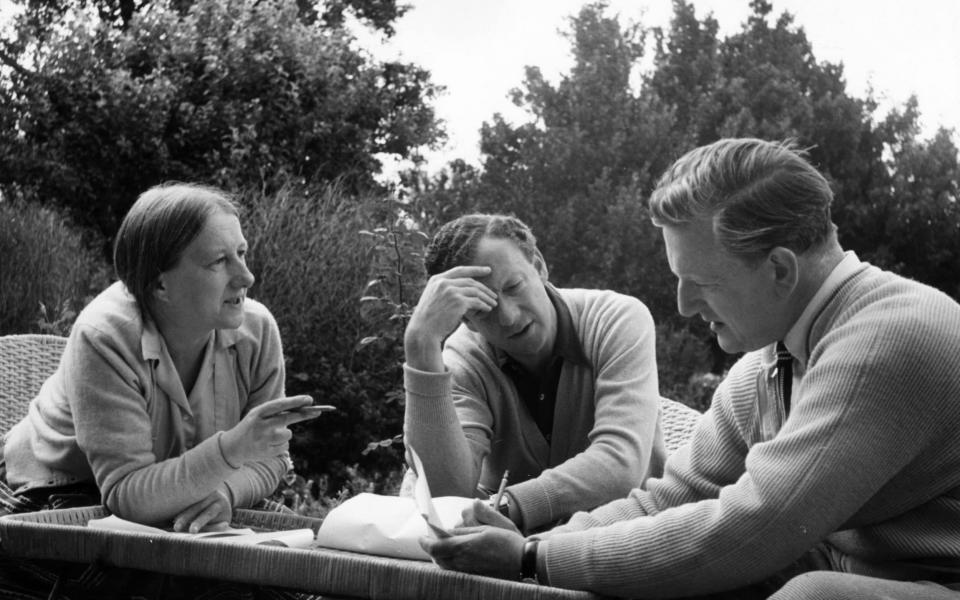 Composers Imogen Holst and Benjamin Britten, with tenor Peter Pears in the garden at Aldeburgh - Hulton Archive