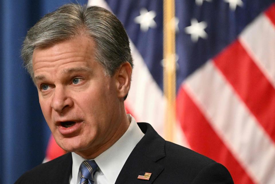 FBI Director Christopher Wray speaks during a press conference to announce action against the cyber gang called Hive on Thursday.