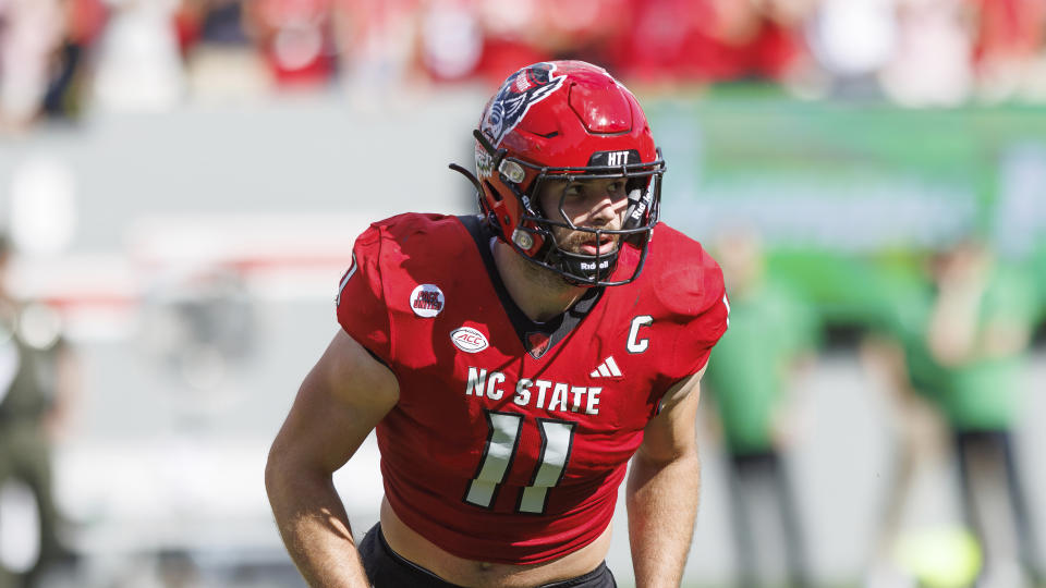 FILE - North Carolina State's Payton Wilson (11) defends during an NCAA football game on Saturday, Oct. 7, 2023, in Raleigh, N.C. Wilson has been selected to The Associated Press midseason All-America team, Wednesday, Oct. 17, 2023. (AP Photo/Ben McKeown, File)