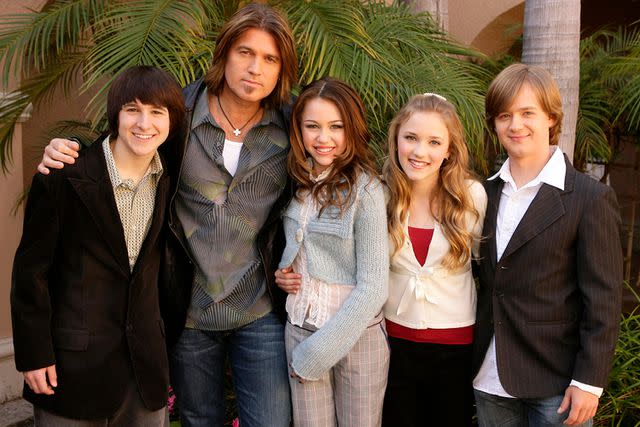 <p>Jesse Grant/WireImage</p> Mitchel Musso, Billy Ray Cyrus, Miley Cyrus, Emily Osment and Jason Earles