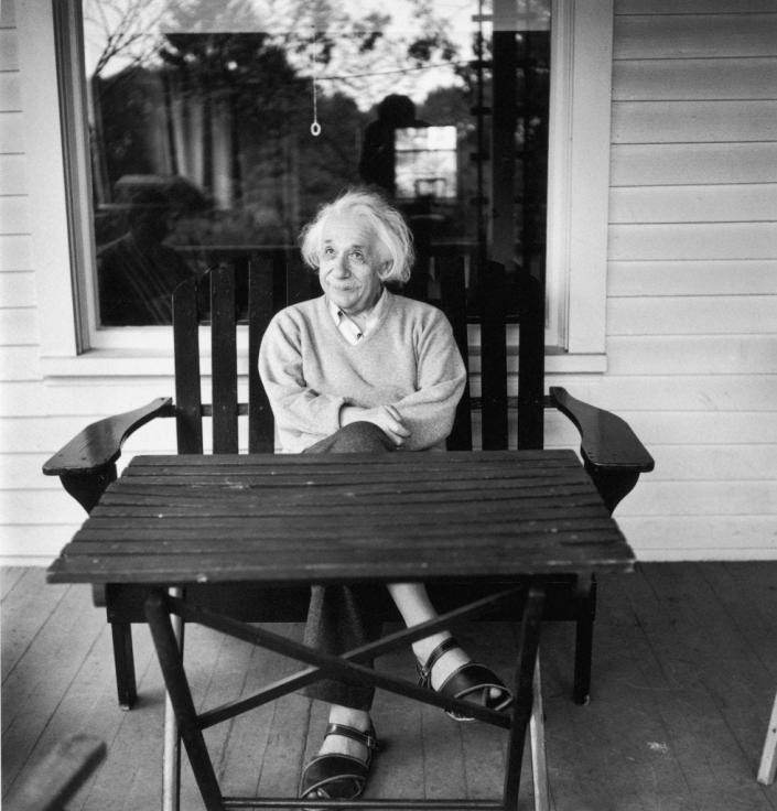Photo of Albert Einstein on his porch at home in Princeton, New Jersey.