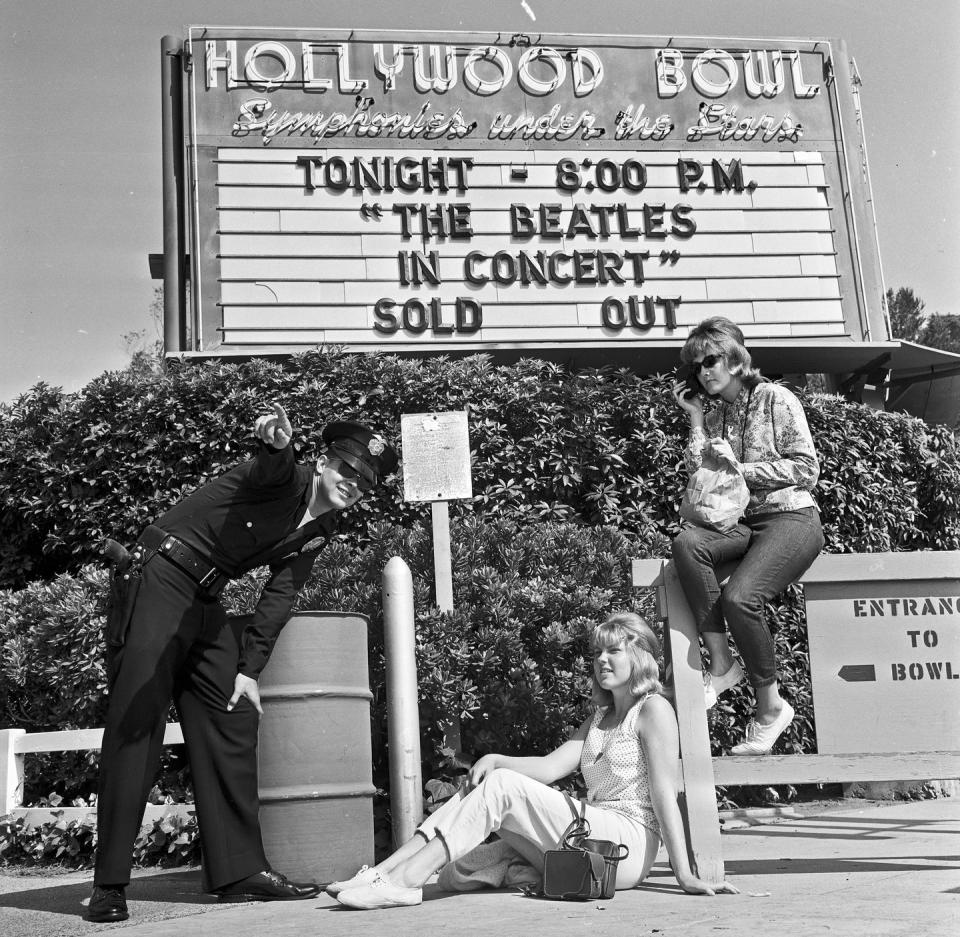 <p>Another hot ticket in 1964 was to see The Beatles perform live at the Hollywood Bowl. Weren't alive to see it? You can purchase their album with recordings from the show on <a href="https://www.amazon.com/Live-At-Hollywood-Bowl-Beatles/dp/B01IO7OHTU?tag=syn-yahoo-20&ascsubtag=%5Bartid%7C10063.g.35661651%5Bsrc%7Cyahoo-us" rel="nofollow noopener" target="_blank" data-ylk="slk:Amazon;elm:context_link;itc:0;sec:content-canvas" class="link ">Amazon</a>. </p>