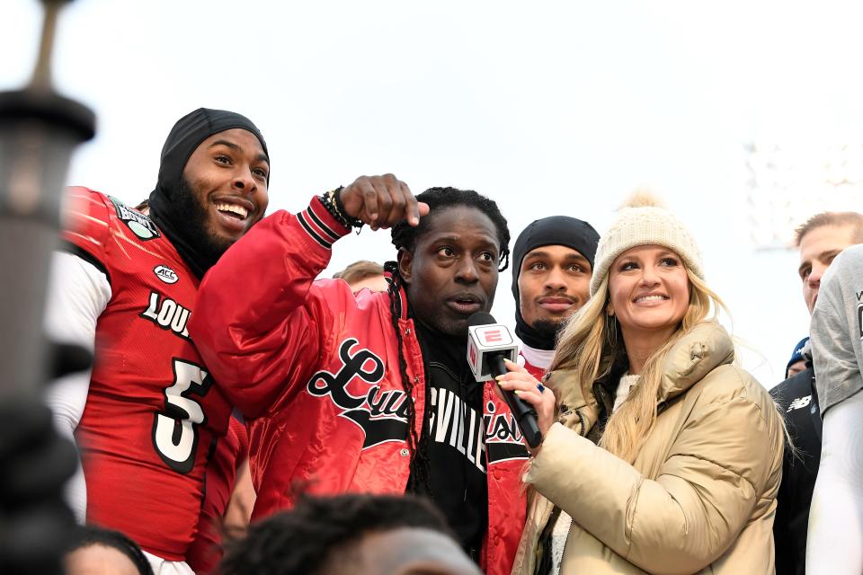 Dec 17, 2022; Boston, MA, USA; Louisville Cardinals Deion Branch interim head coach  during the second half at Fenway Park. Mandatory Credit: Eric Canha-USA TODAY Sports