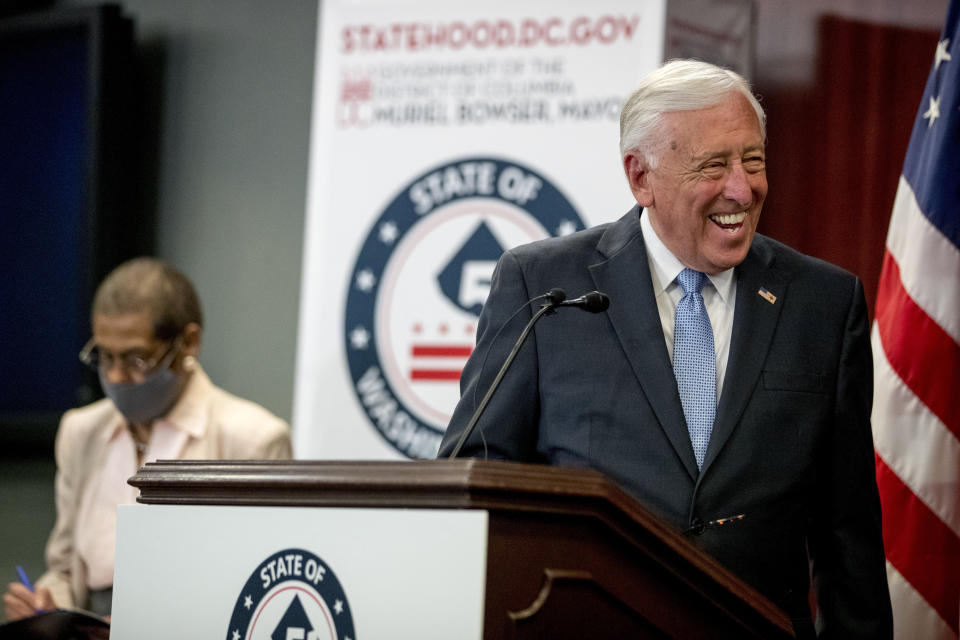 House Majority Leader Steny Hoyer of Md., right, accompanied by Del. Eleanor Holmes Norton, D-D.C., left, smiles as he speaks at a news conference on District of Columbia statehood on Capitol Hill, Tuesday, June 16, 2020, in Washington. Hoyer will hold a vote on D.C. statehood on July 26. (AP Photo/Andrew Harnik)