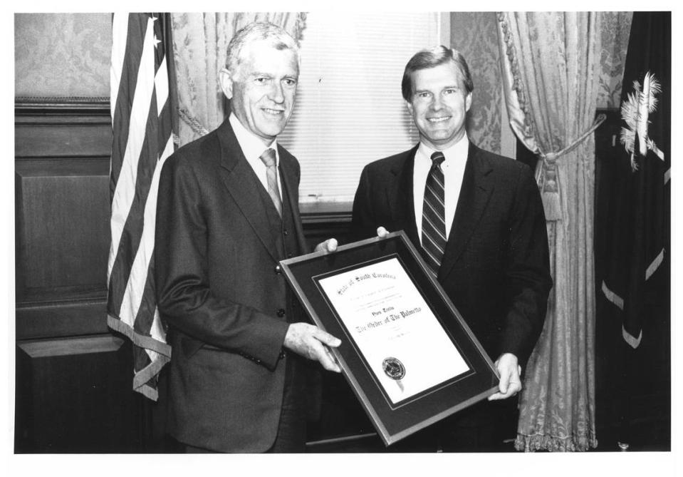 Gov. Carroll Campbell presents the Order of the Palmetto to Yves Trellu on May 5, 1989.