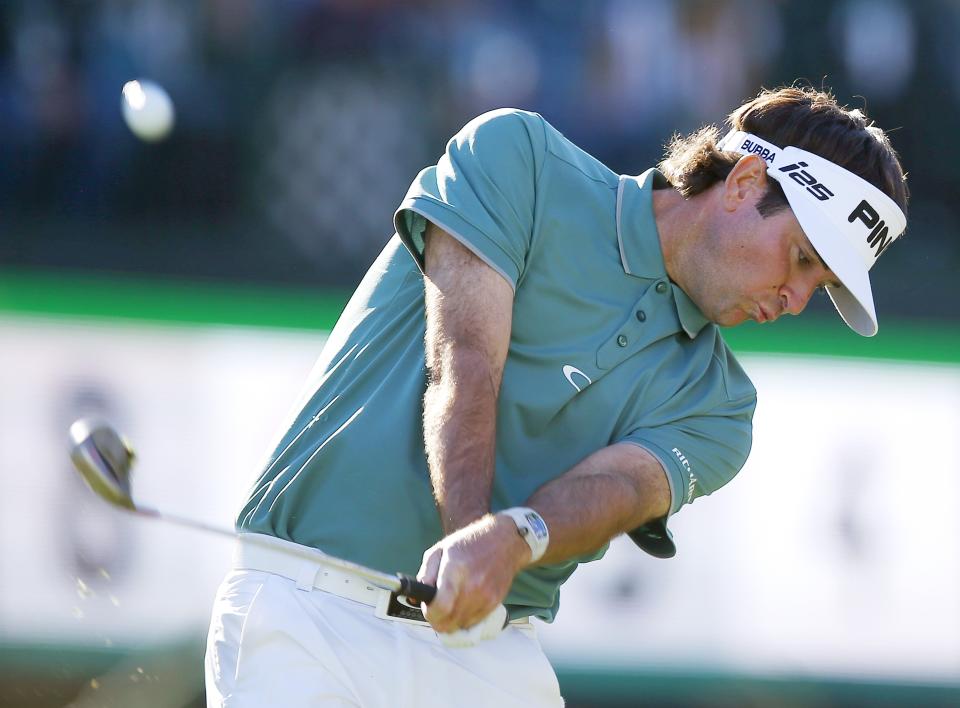 Bubba Watson hits his tee shot at the 16th hole during the third round of the Phoenix Open golf tournament Saturday, Feb. 1, 2014, in Scottsdale, Ariz. (AP Photo/Ross D. Franklin)