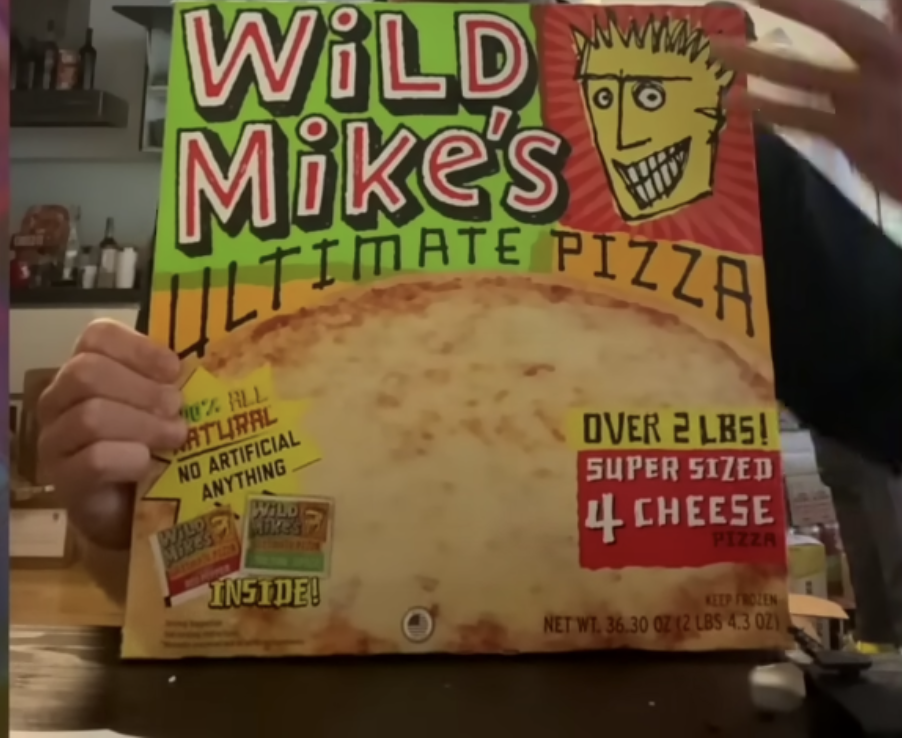YouTube screenshot of someone reviewing Wild Mike's frozen pizza.