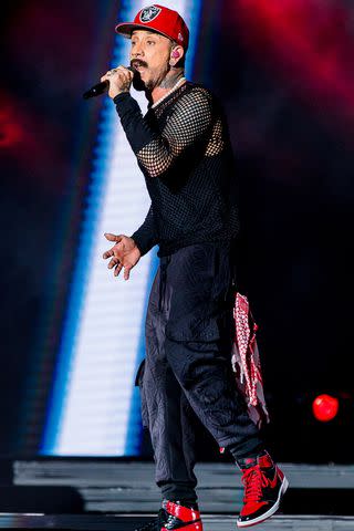 <p>Mauricio Santana/Getty</p> AJ McLean of the Backstreet Boys performs during the DNA World Tour 2023 at Allianz Parque on January 27, 2023 in Sao Paulo, Brazil.