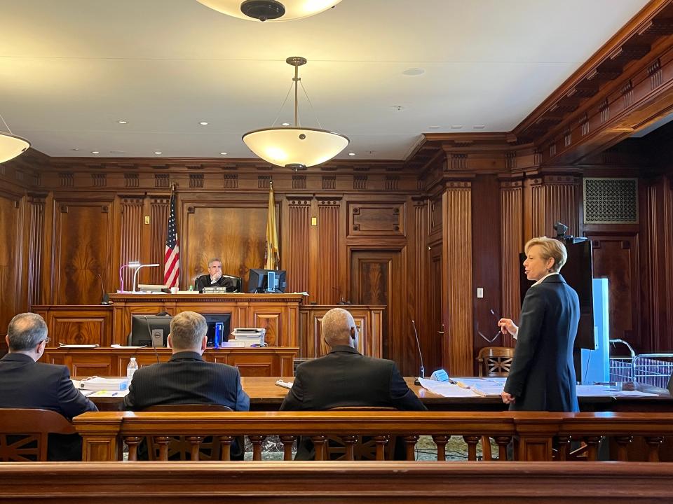 Nancy Erika Smith, the attorney for Padmaja Rao in her whistleblower suit against the town of Montclair and former manager Tim Stafford, addresses the town's prior counsel, Derrick Freijomil, while Judge Stephen Petrillo looks on. Newark's Historic Courthouse, May 26, 2023.