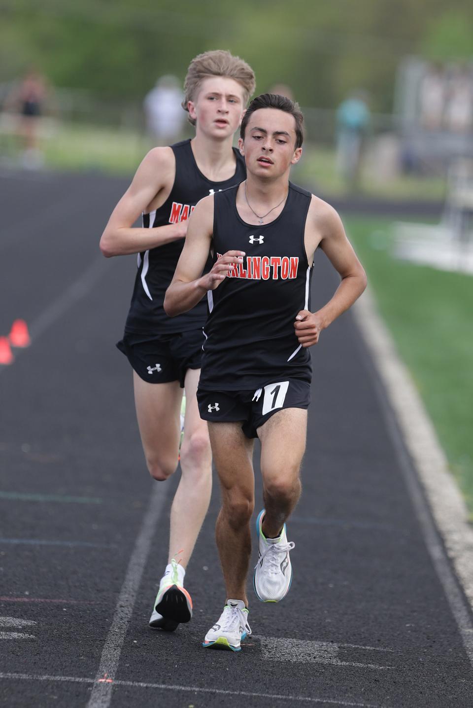 Marlington's Nash Minor, right, and Mike Nicholls, finish one and two in the 3200 meter run at the EBC track and field championships held at Marlington High School Saturday, May 14, 2022.