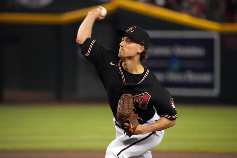 Jun 18, 2022; Phoenix, Arizona, USA; Arizona Diamondbacks starting pitcher Luke Weaver (7) throws against the Minnesota Twins during the first inning at Chase Field.