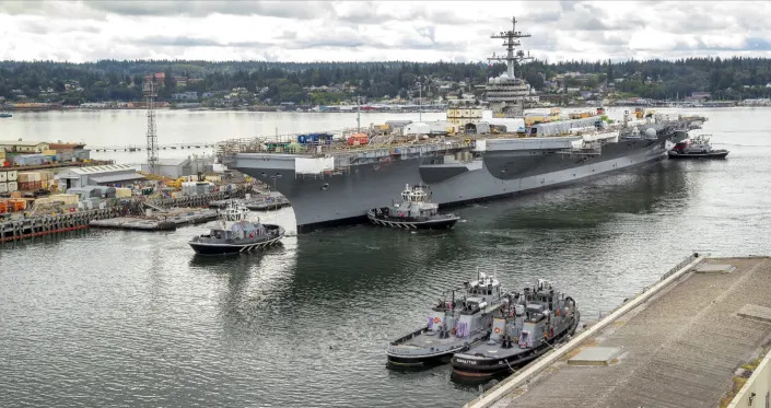 The USS Theodore Roosevelt undocks at the Puget Sound Naval Shipyard on Aug. 4.