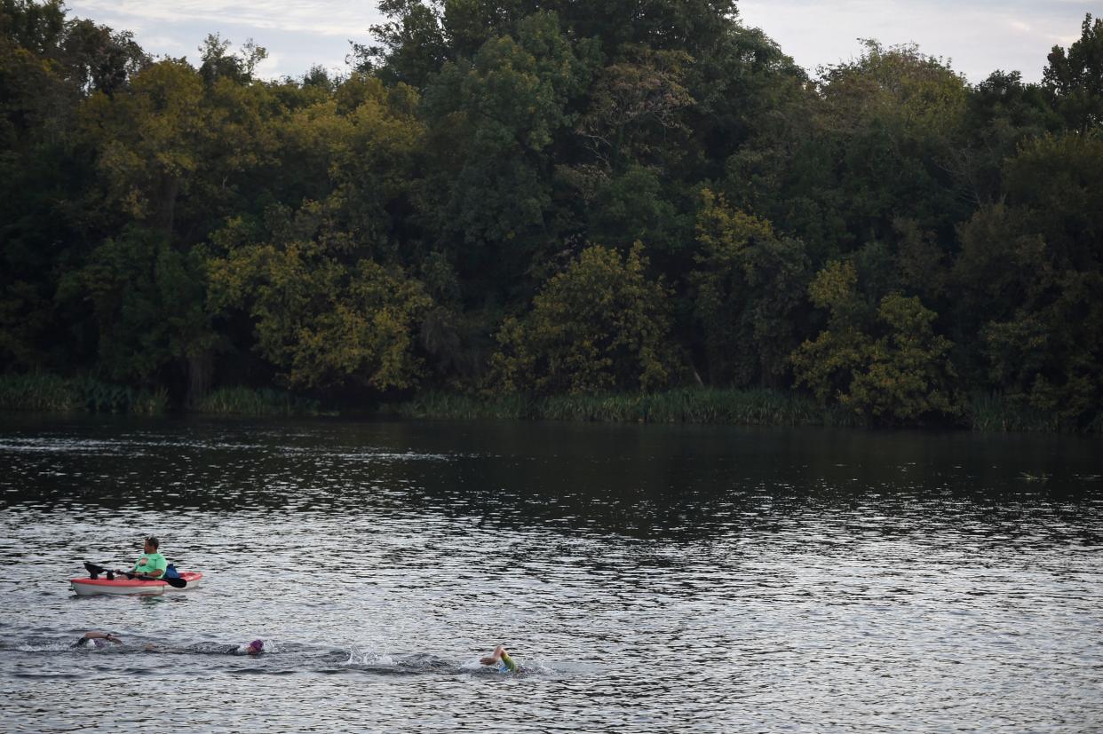 Swimmers start the Ironman 70.3 in Augusta on Sunday, Sept. 25, 2022. Athletes competed in a 1.2 mile swim down the Savannah River, a 56 mile bike ride, and a half marathon.