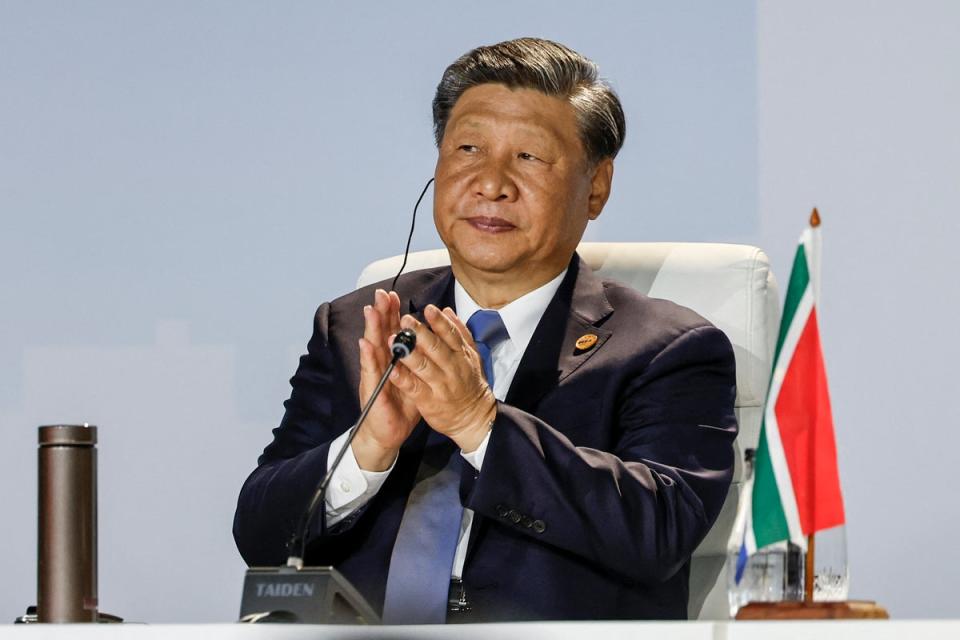 Chinese president Xi Jinping claps during the Brics summit at the Sandton Convention Centre (AFP via Getty Images)