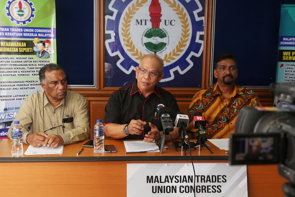 MTUC secretary-general J. Solomon (right) said that the call was not related to any position the previous Pakatan Harapan administration had taken on the free trade agreement, and the objection was because the deal poses significant threat to workers right in the country. — Picture by Choo Choy May