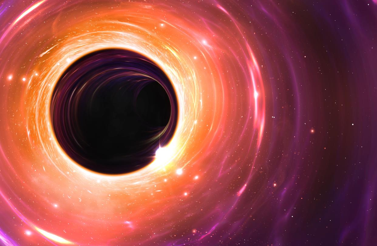 Black hole, illustration. A black hole is an object so compact (usually a collapsed star) that nothing can escape its gravitational pull. Not even light. This black hole is surrounded by a superheated disc of material, an accretion disc, making it visible. The massive gravity is also pulling in a nearby gas cloud, top right.
