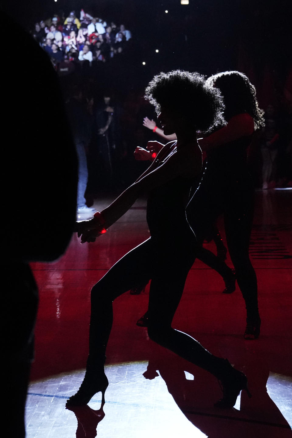 Members of the Chicago Luvabulls perform before an NBA basketball game between the Atlanta Hawks and the Chicago Bulls in Chicago, Monday, April 1, 2024. (AP Photo/Nam Y. Huh)